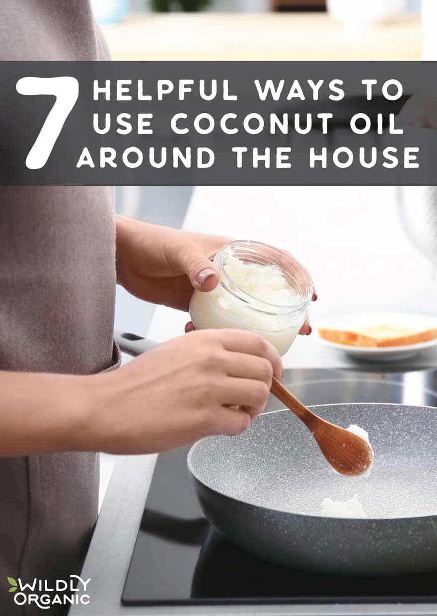 A person scooping coconut oil from a jar into a pan, with text 7 Helpful Ways To Use Coconut Oil Around The House.