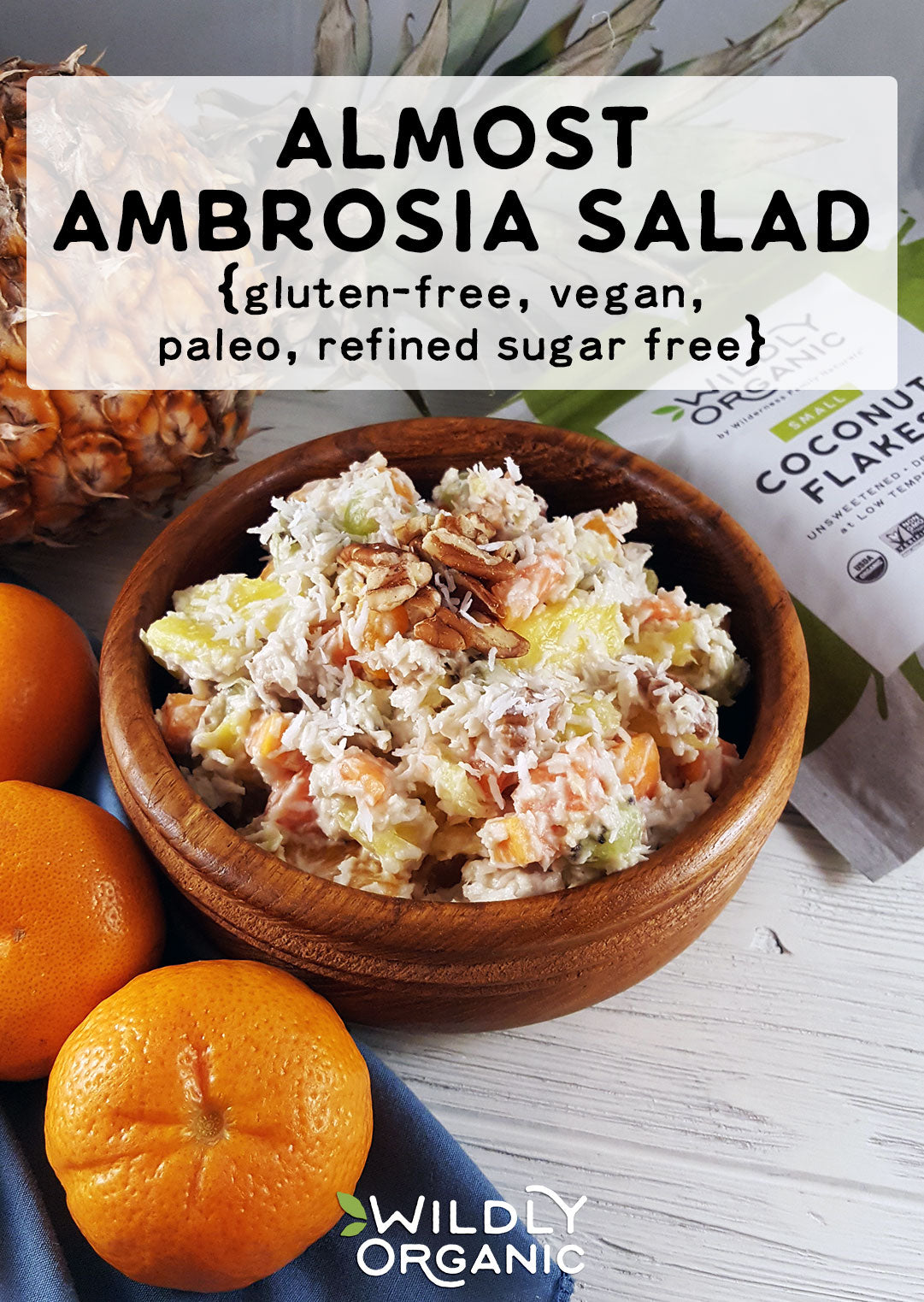 A photo of ambrosia salad with pecans in a bowl. 