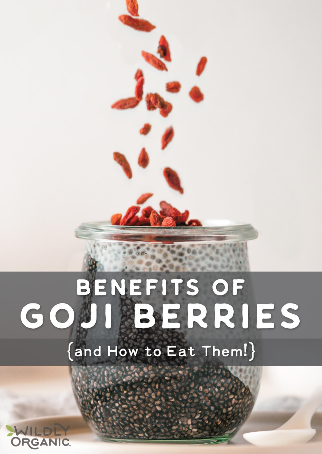 A jar of chia seeds with goji berries falling into it and text