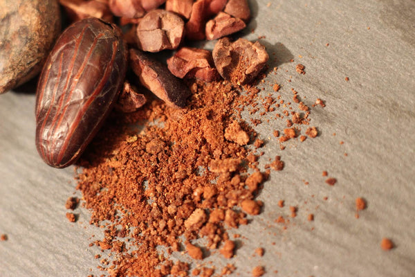 Crushed cacao beans on a flat surface