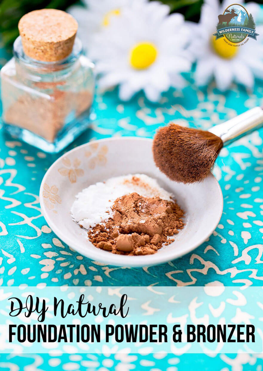 DIY natural foundation powder and bronzer in a bowl with makeup brush on a patterned background.