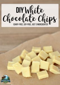 Homemade white chocolate chips on parchment with a label DIY White Chocolate Chips - Dairy-Free, Soy-Free, Just 3 Ingredients!
