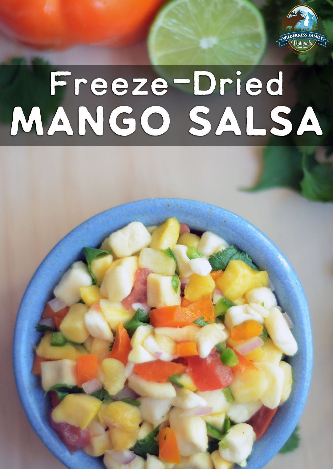 A bowl of mango salsa garnished with cilantro, with text Freeze-Dried MANGO SALSA on top.