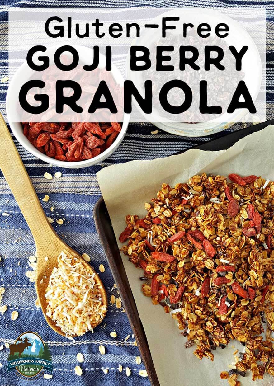 Photo of a sheet pan with goji berry granola and a bowl of goji berries.