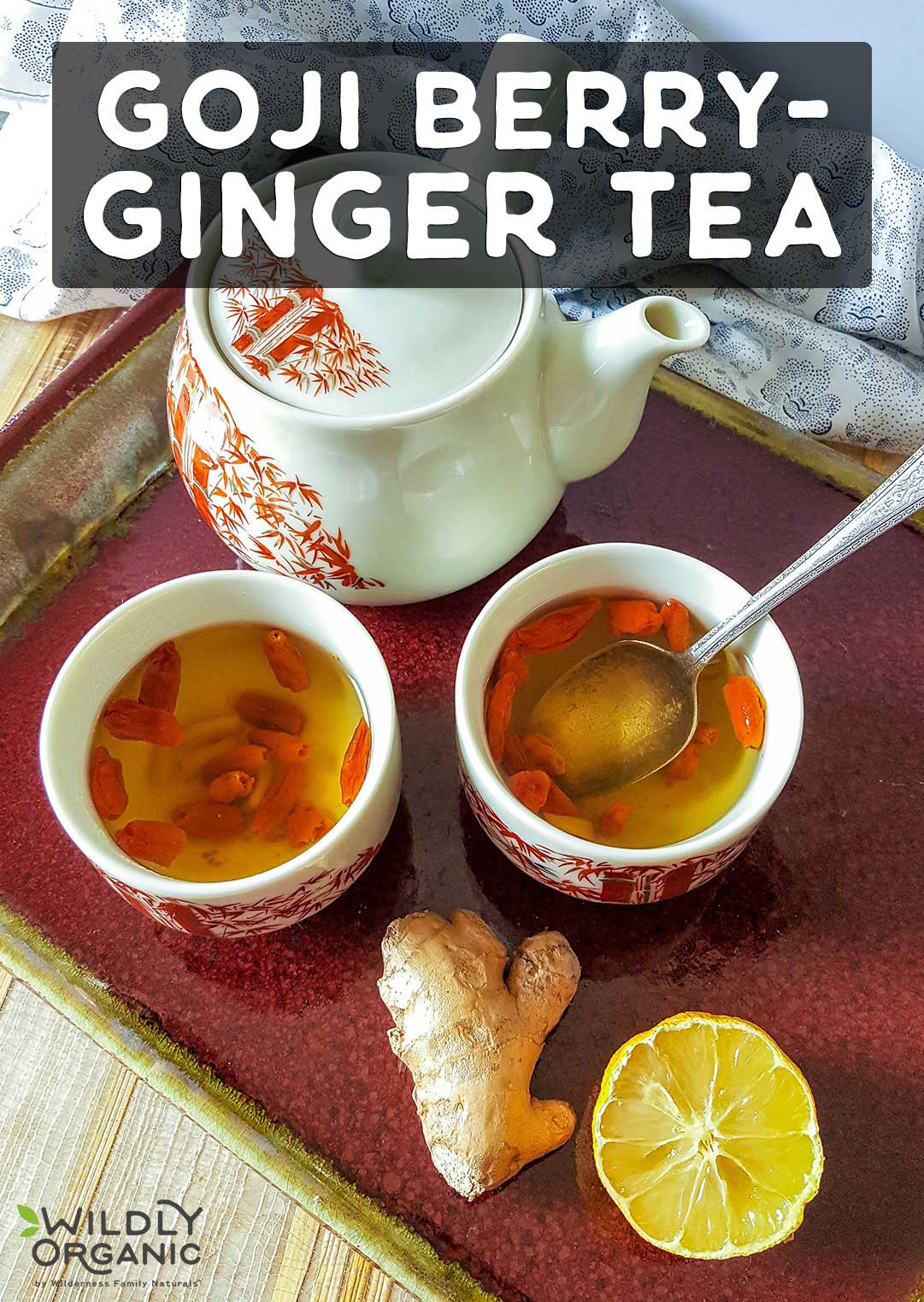 Ginger-goji berry tea in cups and a pot