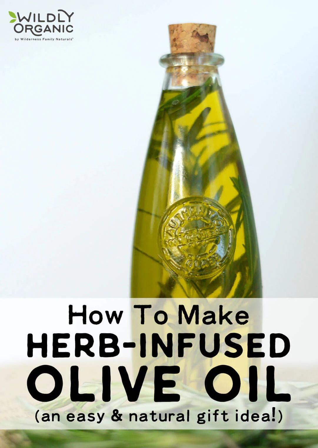 A photography of a glass bottle with cork filled with oil infused with sprigs of rosemary on a table top and white background.- blog post image