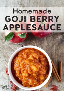 A bowl of food next to apples Homemade Goji Berry Applesauce