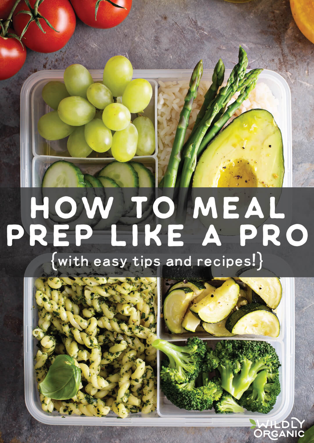 A meal prep container with sections containing cucumbers, grapes, rice, avocado, pasta with pesto, zucchini, and broccoli.