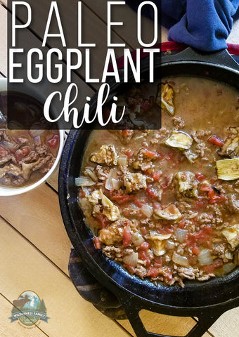 A skillet with paleo eggplant chili, featuring ground meat, chunks of eggplant, and tomatoes. Text PALEO EGGPLANT Chili overlays.