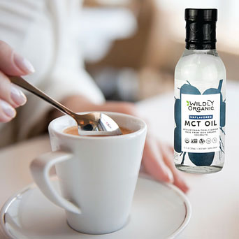 Stirring coffee with MCT Oil