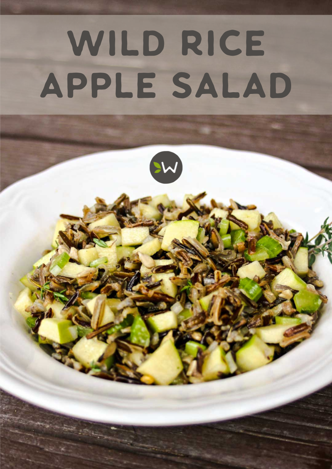A bowl of wild rice apple salad on a wooden surface with a Weight Watchers logo
